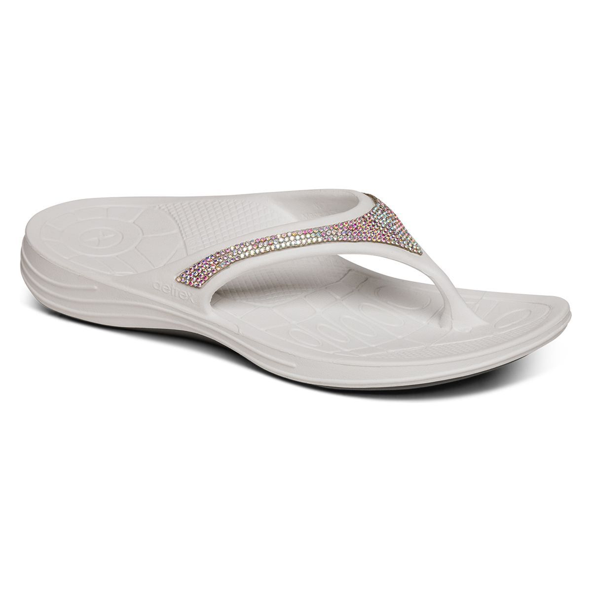 White Aetrex Fiji Sparkle sandal showing soft toe post, contoured arch support, and lightweight textured sole suitable for water use.