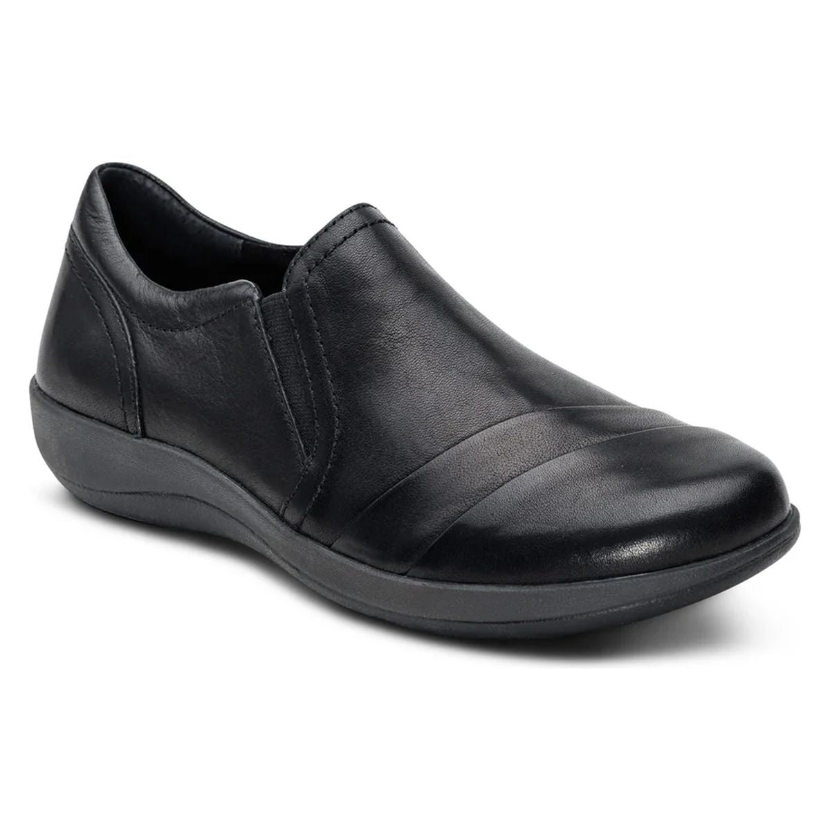 Aetrex black leather slip-on shoe with pleated vamp detail, dual elastic gores, and supportive rubber sole. Style #DM570W.