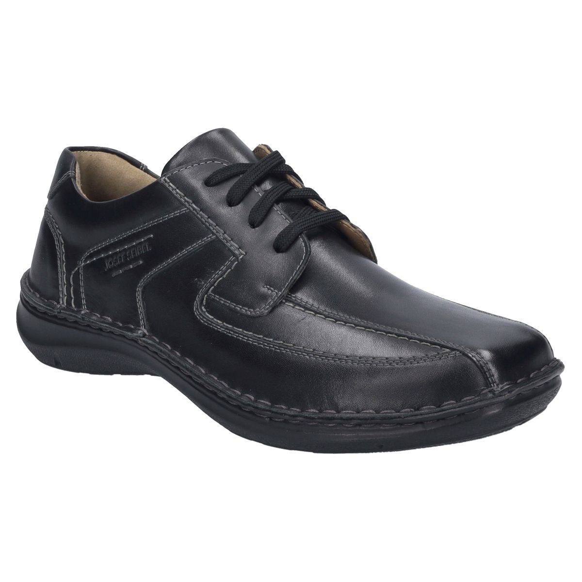 Men’s black leather slip-on shoe with wide fit, elastic side gores, contrast stitching, and removable cushioned footbed. Built for daily comfort and orthopedic support. Style #44908-100