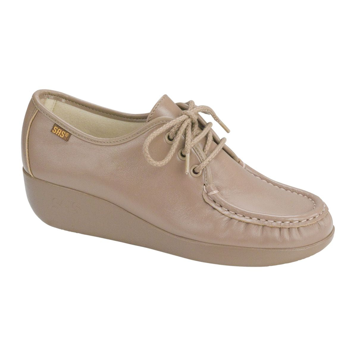 Mocha brown moccasin-style shoe with soft lining, cushioned heel and arch, and a stable polyurethane wedge sole for lasting comfort and support.
Style #0001-015