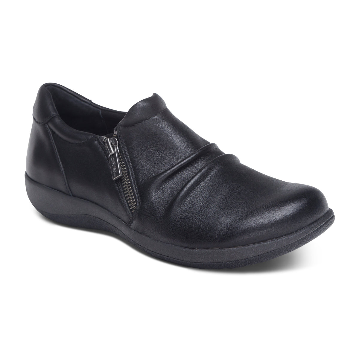 Aetrex Katie Women’s Side Zip Slip-On Shoe in sleek faux leather, featuring side zipper, hook-and-loop adjustability, cushioned midsole, and built-in arch support. Style #DM550WW