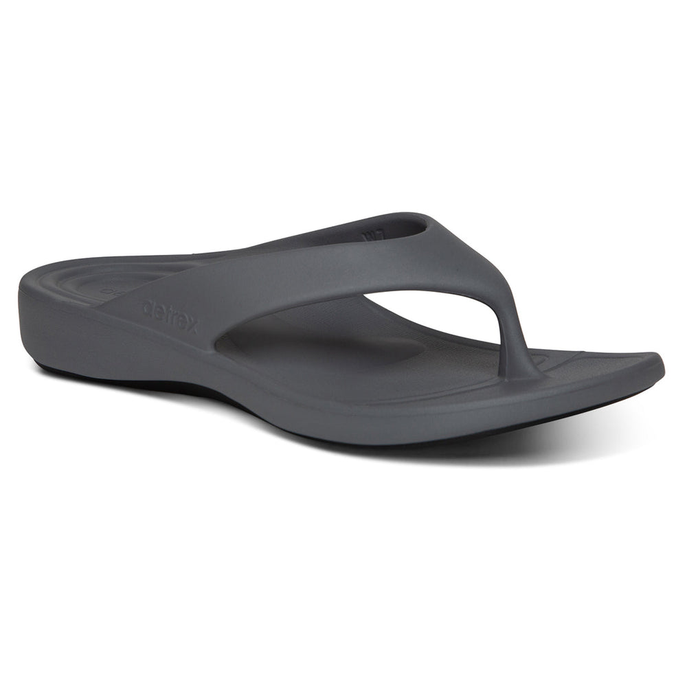 Grey EVA foam flip-flop with contoured heel, soft toe post, and textured footbed. Designed with built-in arch support and dual-density sole for shock-absorbing comfort and water-friendly wear. Style #L3100W