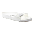 All-white molded EVA one-strap slide sandal with an adjustable matching white buckle. Style #128183.