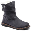A style image of the Uppsala Shearling Boot, which is a dark grey boot with a suede and shearling upper, a contoured cork footbed, and a rubber outsole.