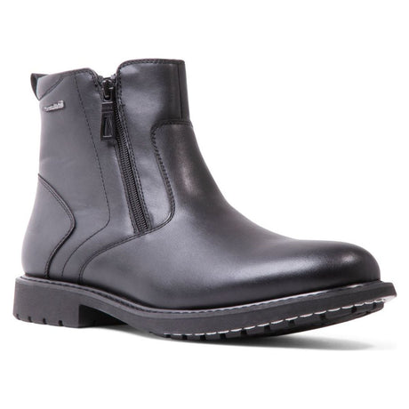 Black leather ankle boot with double side zippers, Thinsulate tag, low block heel, and lug sole. Blondo Style #B1158