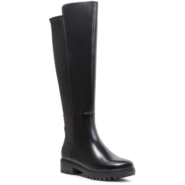 A black tall boot with a 1.5-inch heel, back zipper, and synthetic stretch back panels. Womens Waterproof boot by Blondo - Samira. 