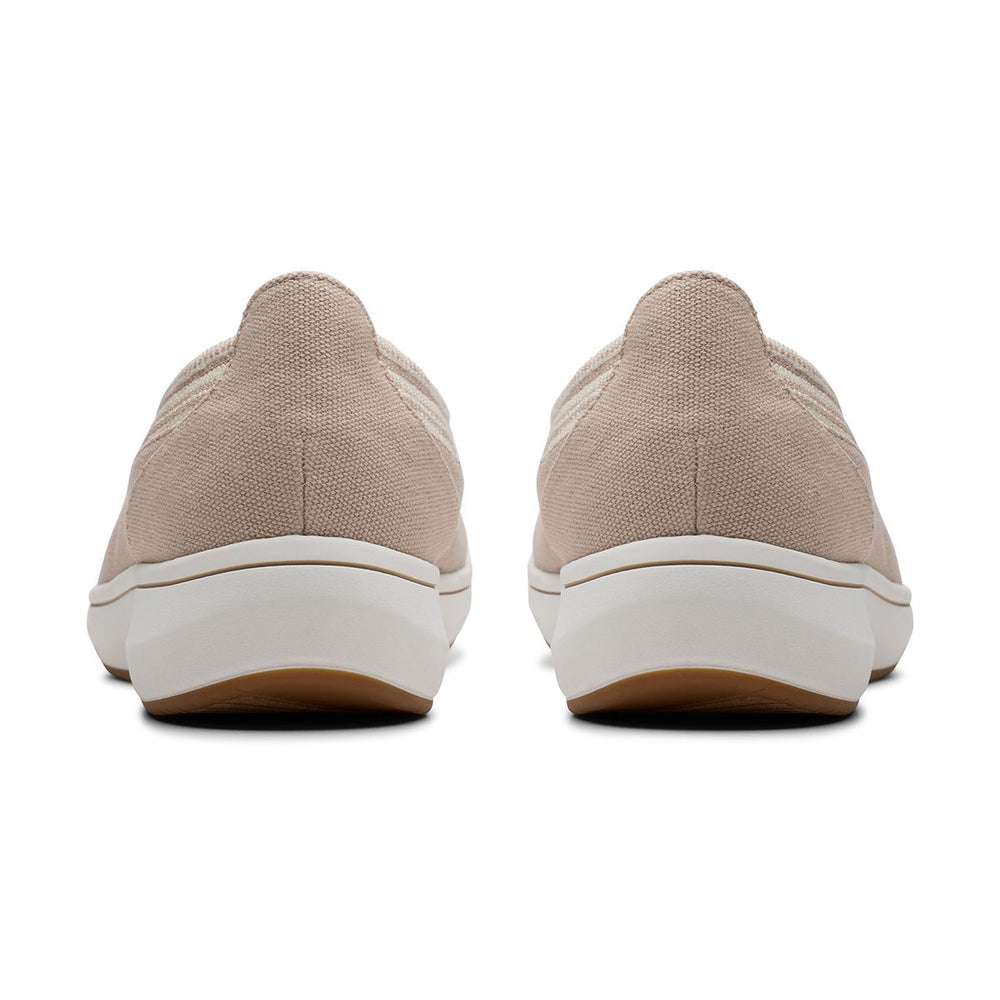 Clarks Women's Breezesky Air Slip On Shoes in Sand