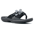 Clarks Brinkley Flora women’s thong sandal in black patent with floral strap detail. Style #26159852