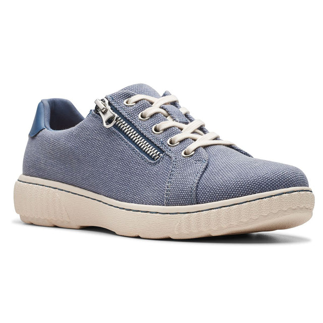 Women’s denim canvas sneaker with white laces, a functional side zipper, blue heel tab, and a cream rubber sole. Style #26178063