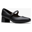 Black leather Mary Jane dress shoe featuring an adjustable buckle strap and a sturdy mid block heel. Style #26184376
