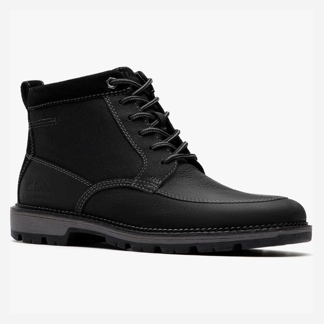 Clarks black leather waterproof lace-up ankle boot with contrast stitching, rear pull tab, and lugged sole. Style #26184464