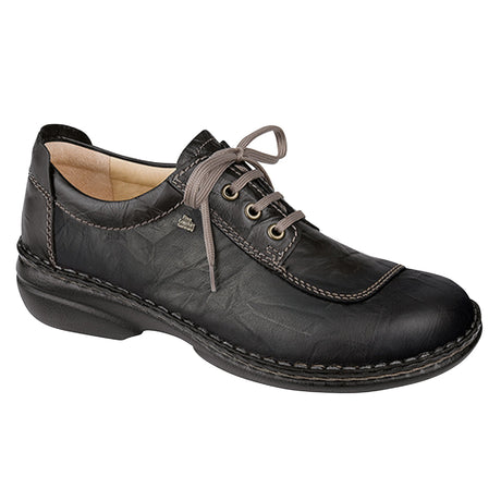 Black leather lace-up shoe with hand-stitched seams, removable cork footbed, and cushioned polyurethane sole designed for wide feet and everyday orthopedic comfort.  Style #2056211099
