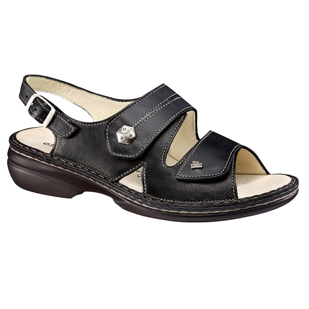 Black nubuck leather sandal with two Velcro straps and a buckle backstrap, featuring a removable cork footbed and cushioned polyurethane sole for orthopedic comfort. Style #2560014099