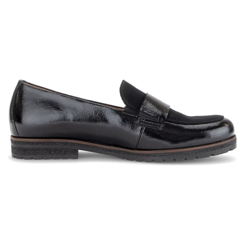 Black patent leather loafer featuring a black suede upper panel, penny strap, and low lugged sole. Style #042.37 G