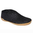 Glerups rubber black slipper with natural wool upper and durable rubber sole for indoor and outdoor wear – available at Walking on a Cloud Canada.