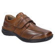 Men’s cognac leather slip-on shoe with wide fit, elastic side gores, contrast stitching, and removable insole. Lightweight, supportive, and orthotic-friendly. Style #44902-370
