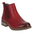 Chelsea-style waterproof boot in bright red leather with elastic side panels, low heel, and a rugged outsole. Designed for slip-on ease and cushioned all-day wear. Style #717181_24400