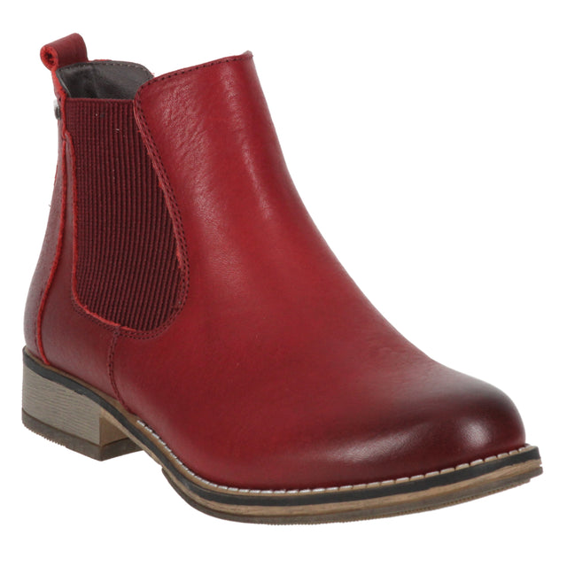 Chelsea-style waterproof boot in bright red leather with elastic side panels, low heel, and a rugged outsole. Designed for slip-on ease and cushioned all-day wear. Style #717181_24400