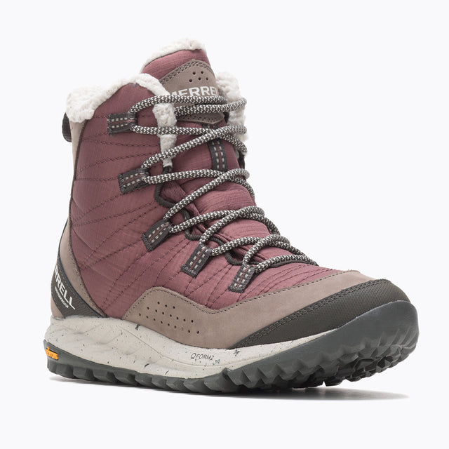 A women's waterproof boot with lace-up closure, primarily in brown color, with a small amount of white fur lining visible at the top. Merrell Antora Lightweight Senaker Boot