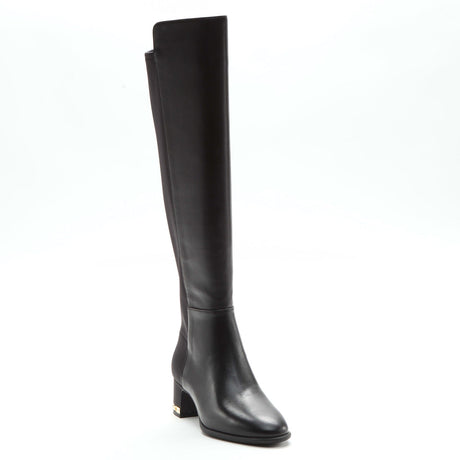 A black, knee-high MICHAEL Michael Kors boot with a round toe and side zip closure. June Flex.