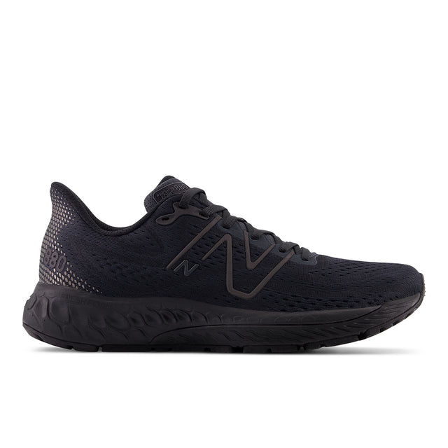 Women's New Balance Fresh Foam X 880v13 neutral running shoe in all black with engineered mesh upper and black N logo. Style #W880T13.