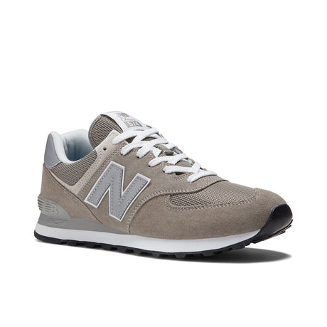 New Balance Men’s 574EVG casual sneaker in Grey/White suede and mesh, featuring ENCAP midsole cushioning and classic retro silhouette – available at Walking on a Cloud Canada. Style #ML574EVG