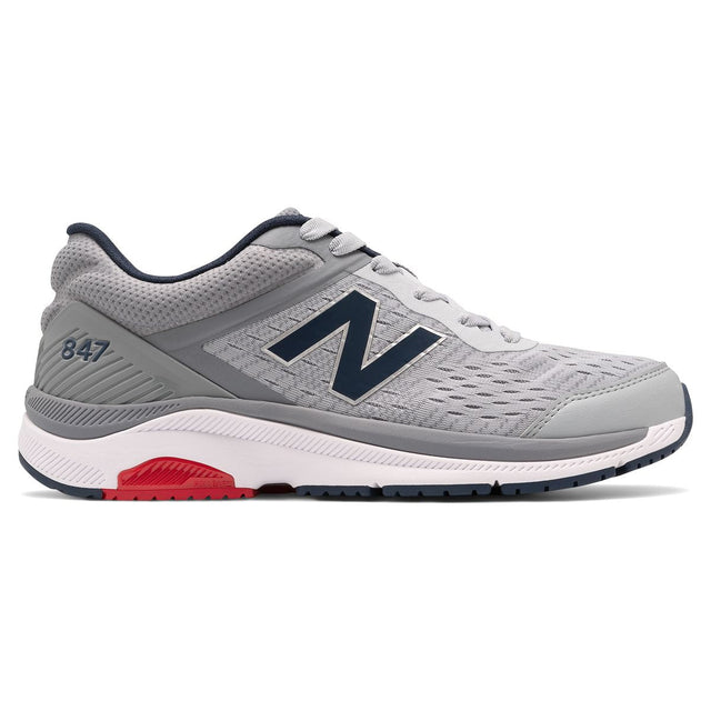 Men’s grey mesh walking sneaker with a navy "N" logo, white midsole, and red ROLLBAR technology. Style #MW847LG4.