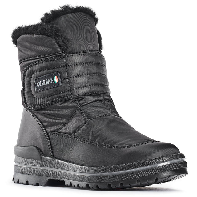 Black vegan winter boot with quilted padded polyester upper, quick adjustable Velcro strap, wool lining, silver-insulated removable insole, and durable ALASKA outsole by OC System® featuring integrated cleats for superior traction on icy surfaces.