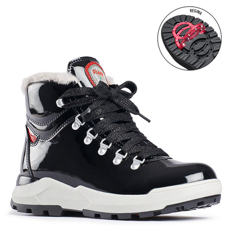 A black waterproof warm winter boot with a lace closure and a thick sole designed for outdoor use. The boot has a patent leather look and is pictured with a detail showing the temperature range it provides comfort in. Has folding clips to help prevent slipping. Olang Piper