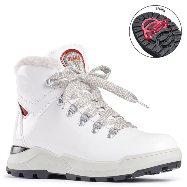 A white waterproof warm winter boot with a lace closure and a thick sole designed for outdoor use. The boot has a patent leather look and is pictured with a detail showing the temperature range it provides comfort in. Has folding clips to help prevent slipping. 