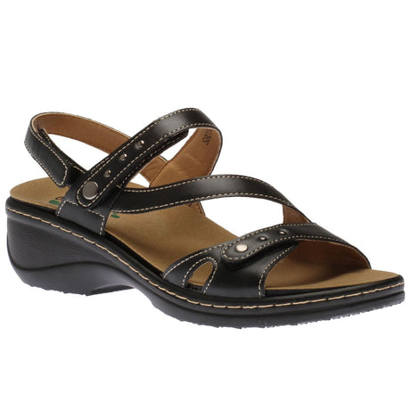 Women's black leather multi-strap wedge sandal with metal stud details, a tan footbed, and a contoured black sole. Style #S8010.