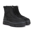 A pair of black women's boots with a front zip and ice-gripper technology outsole, designed for winter wear. Pajar Huilia