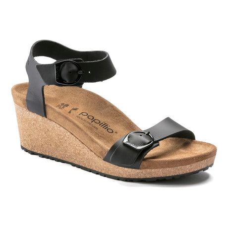 Papillio Soley Adjustable Strap Leather Wedge Sandal in black with built in arch support for all day comfort. 
