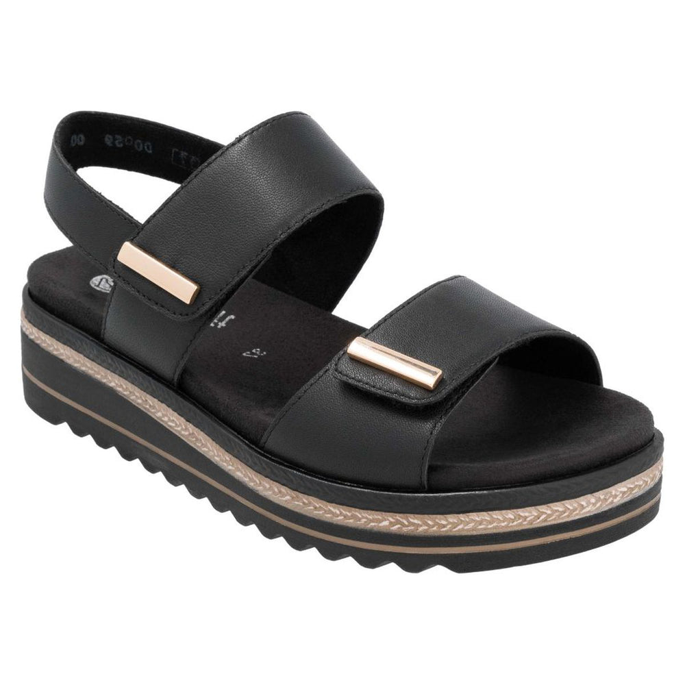 Women’s black leather sandal with two adjustable straps, gold accents, and a white platform lug sole. Style #D0Q59-00