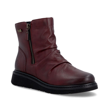 Remonte red leather ankle boot with slouched shaft detail, outer side zipper, and black low wedge sole. Style #D3981-35
