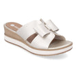 Remonte D6456 Women's Mule Sandals in Pale Gold, pearlecemt leather upper, slight wedge heel, decorative bow. Style #D6456-92