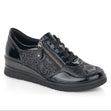 Black patent and embossed floral lace-up sneaker with side zipper and cushioned wedge sole. Style #R0701-03