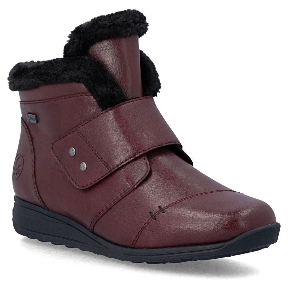 Rieker deep red leather wide ankle boot with black faux fur collar and adjustable hook-and-loop strap. Style #47268-35