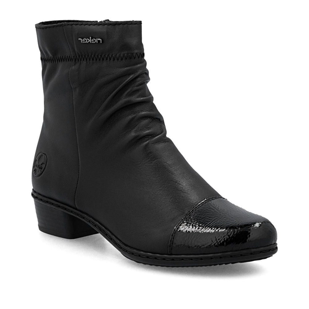 Black leather mid-height boot with ruched shaft, glossy patent toe cap, side zip, and low block heel. Style # Y0773-00