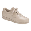 Light beige SAS Free Time women’s walking shoe with lace-up design, cushioned sole, and soft fabric lining, side view showing ergonomic shape and flexible outsole. Style #0083-002
