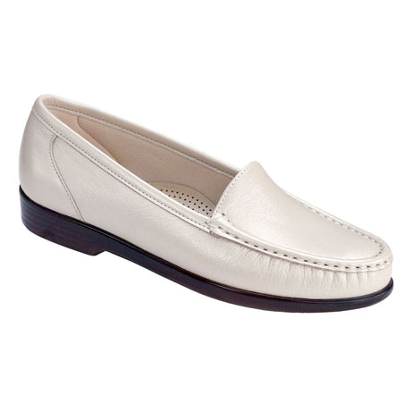 SAS Simplify women’s slip-on loafer in Bone/Pearl soft leather with smooth finish, padded lining, removable cushioned footbed, and 1-inch heel for versatile everyday wear.
Style #1550-175