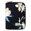 Black zip-around passport wallet featuring a large cream and green floral print and a gold logo plate. Style #43401-50C
